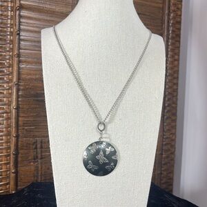 Butterfly Disc Pendant on a Silver Tone Chain Necklace